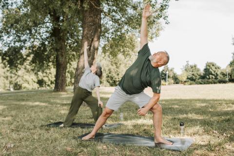 retired couple doing yoga